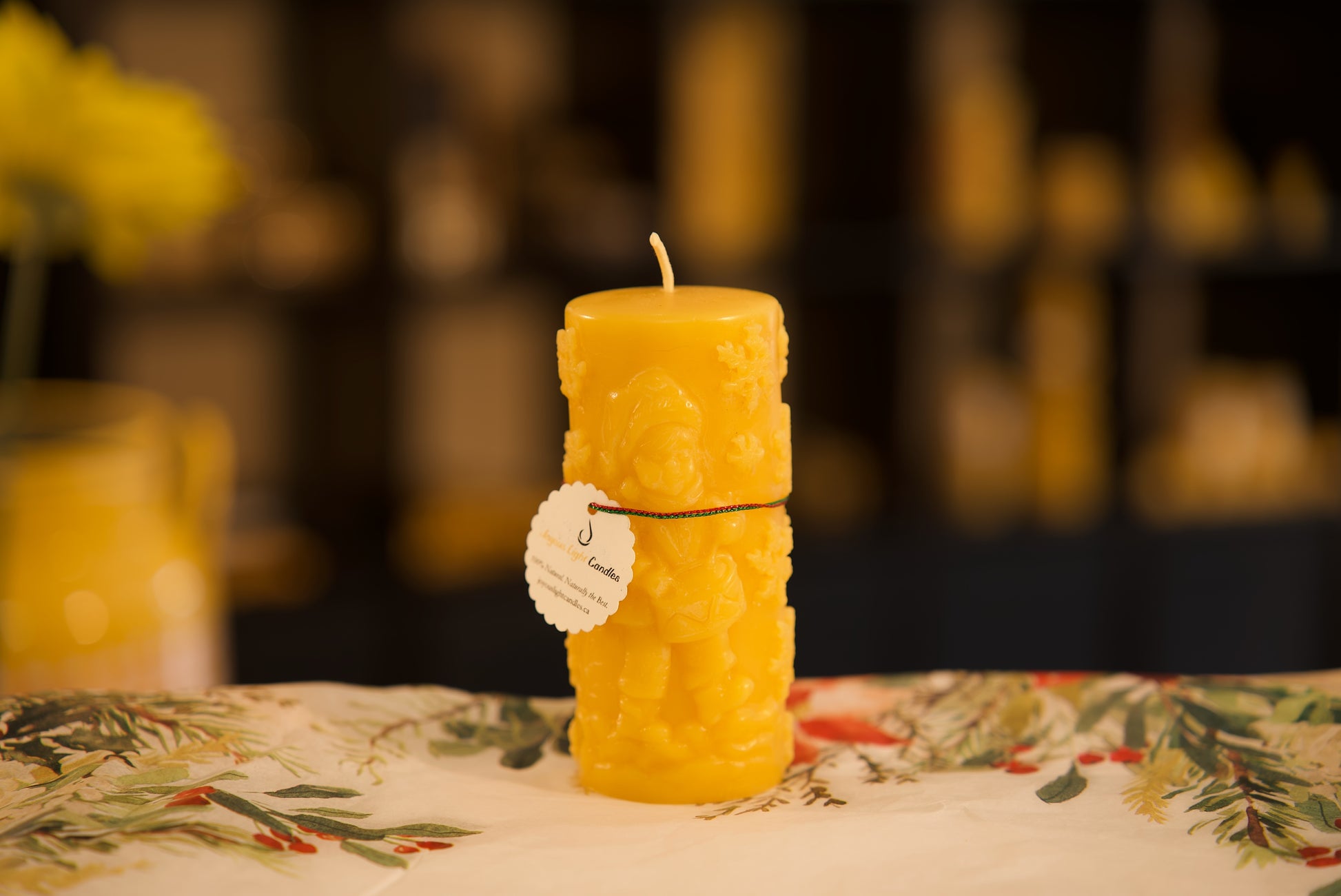 Traditional holiday beeswax candle featuring nostalgic drummer boy design, non-toxic, 2x4.75 inches